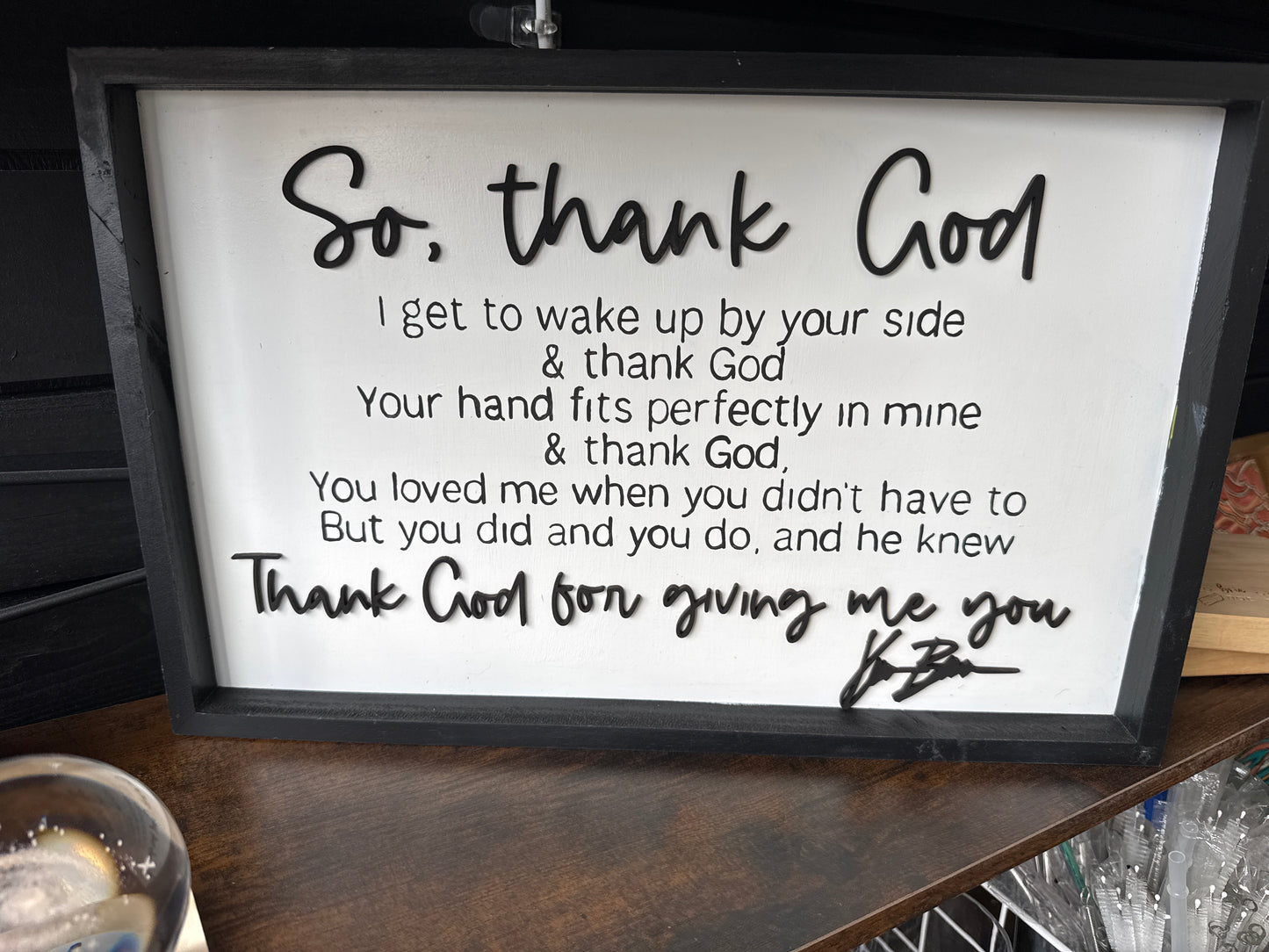 “Thank God” Lyrics sign