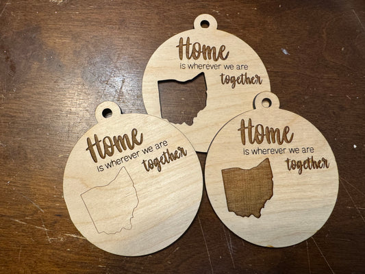 "Home is where we are together" state ornaments