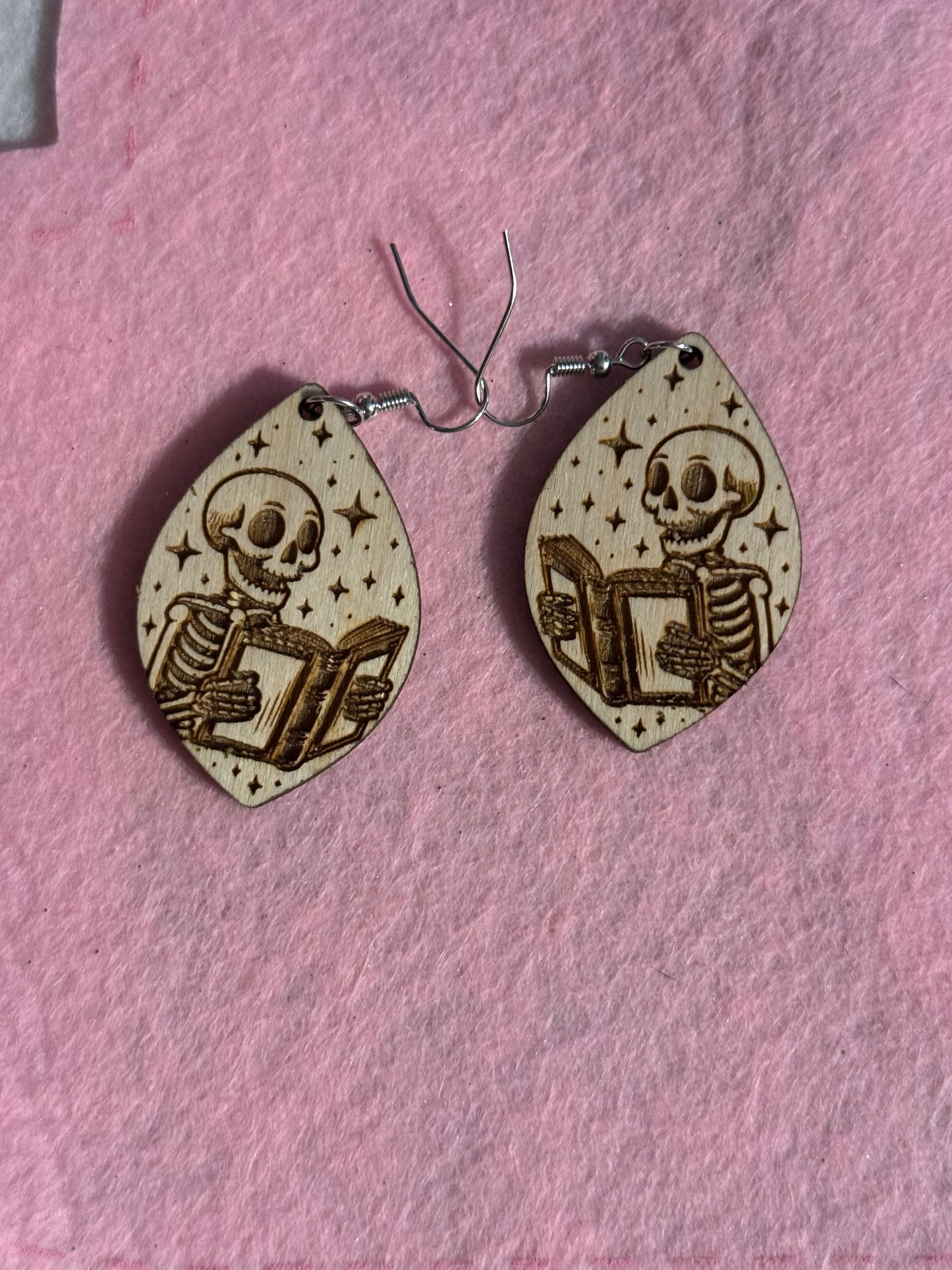 Book reading Skeleton Earrings