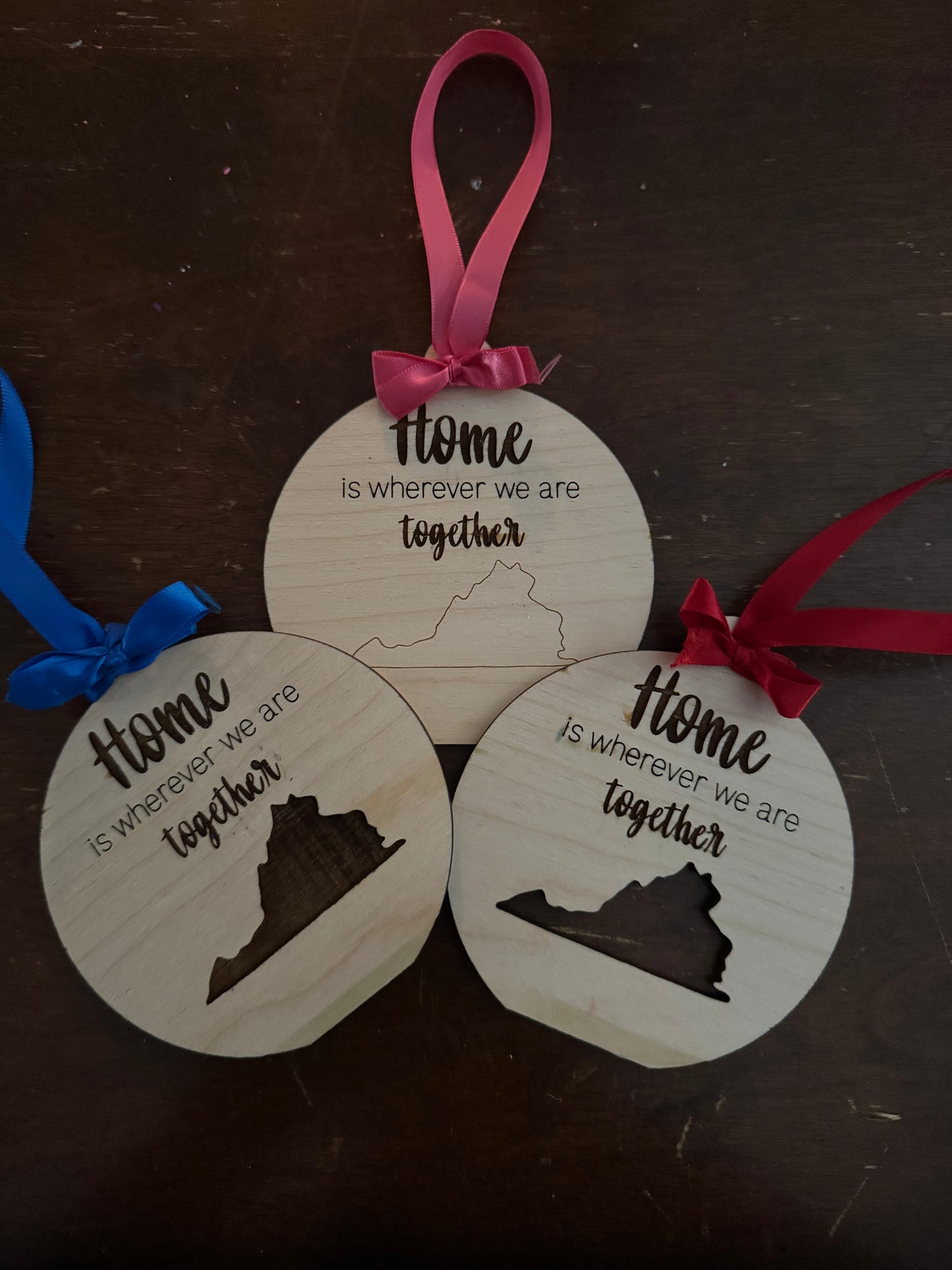 "Home is where we are together" state ornaments