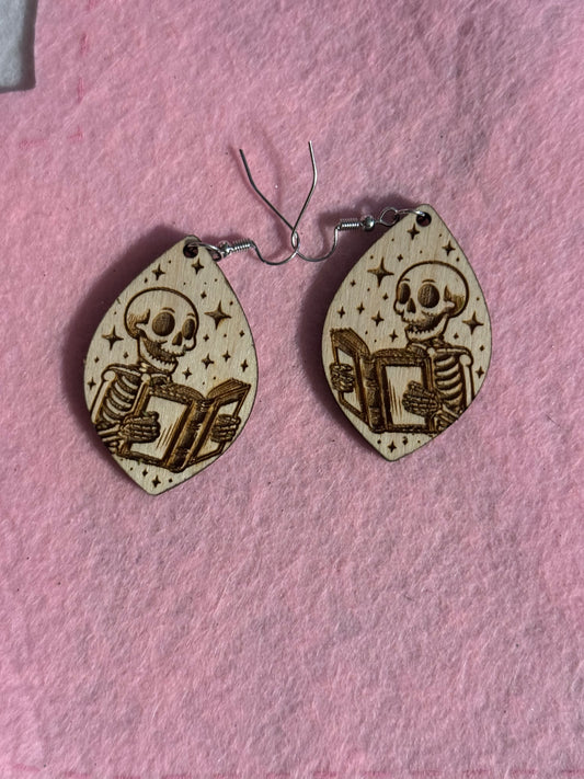 Book reading Skeleton Earrings